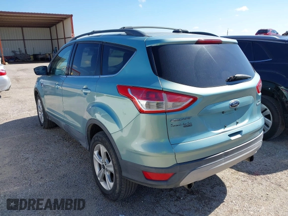 2013 Ford Escape SE with VIN 1FMCU0GX6DUA85991, listed as a IAAI auction lot 42222248 with 136,457 mi miles and . Bid and sale history available at DreamBid. Image 3.