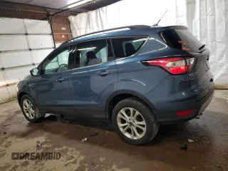 2018 Ford Escape SE z VIN 1FMCU9GD6JUC30324, wystawiony jako Copart lot #55833765 z przebiegiem 48 016 mil mil oraz Szkoda całkowita • Salvage title. Historia ofert i sprzedaży dostępna na DreamBid. Obrazek 2.