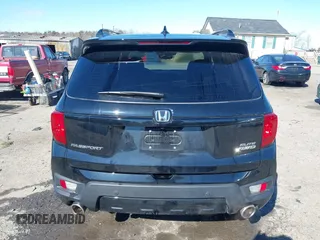 2023 Honda Passport Elite with VIN 5FNYF8H04PB006514, listed as a IAAI auction lot 41537826 with 14,640 mi miles and . Bid and sale history available at DreamBid. Image 17.