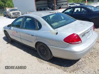 2005 Ford Taurus SE with VIN 1FAFP53U85A117320, listed as a IAAI auction lot 42121647 with 179,434 mi miles. Bid and sale history available at carsss.com. Image 3.