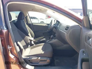 2016 Volkswagen Jetta Sedan 1.4T SE with VIN 3VWD67AJ2GM340416, listed as a IAAI auction lot 41663211 with 157,283 mi miles. Bid and sale history available at carsss.com. Image 5.