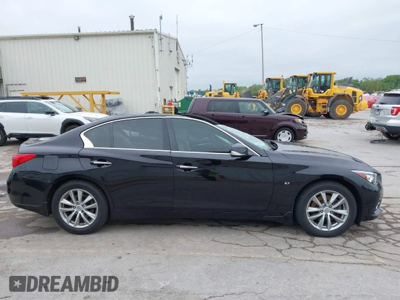 2015 Infiniti Q50 Premium with VIN JN1BV7AR8FM396828, listed as a IAAI auction lot 42313019 with 130,707 mi miles and . Bid and sale history available at DreamBid. Image 12.