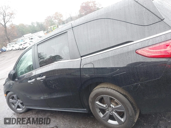 2021 Honda Odyssey EX with VIN 5FNRL6H53MB010305, listed as a IAAI auction lot 41028592 with 39,368 mi miles and . Bid and sale history available at DreamBid. Image 14.