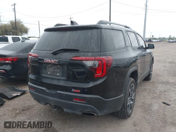 2021 GMC Acadia SLT with VIN 1GKKNMLS4MZ141920, listed as a IAAI auction lot 41149390 with 81,090 mi miles. Bid and sale history available at carsss.com. Image 4.