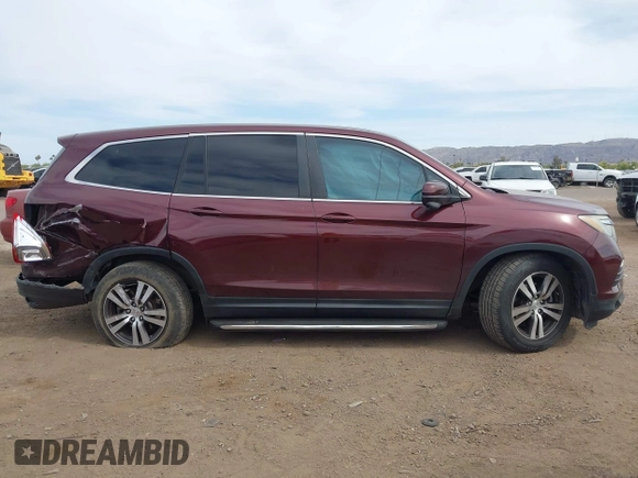 2016 Honda Pilot EX-L with VIN 5FNYF5H57GB028307, listed as a IAAI auction lot 41925711 with 125,118 mi miles and . Bid and sale history available at DreamBid. Image 13.