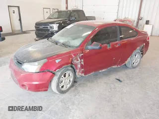 2009 Ford Focus SE with VIN 1FAHP32N49W222419, listed as a IAAI auction lot 42113655 with 238,936 mi miles. Bid and sale history available at carsss.com. Image 2.
