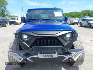2019 Jeep Wrangler Unlimited Sport Altitude with VIN 1C4HJXDG2KW532866, listed as a IAAI auction lot 42320008 with 66,316 mi miles and . Bid and sale history available at DreamBid. Image 12.