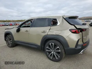 2025 Mazda CX-50 Premium z VIN 7MMVABDY4SN312522, wystawiony jako Copart lot #49078495 z przebiegiem 963 mil mil oraz Szkody całkowita. Historia ofert i sprzedaży dostępna na DreamBid. Obrazek 2.