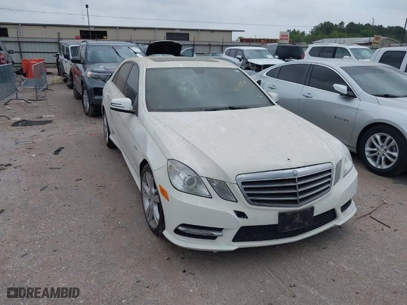 2012 Mercedes-Benz E-Class E 350 Luxury with VIN WDDHF5KB9CA659728, listed as a IAAI auction lot 41948569 with 156,322 mi miles. Bid and sale history available at carsss.com. Image 1.