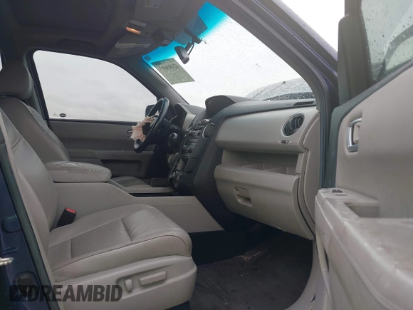 2013 Honda Pilot Touring with VIN 5FNYF4H95DB007125, listed as a IAAI auction lot 42493693 with Not provided miles and . Bid and sale history available at DreamBid. Image 5.