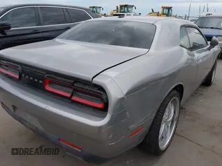2016 Dodge Challenger SXT Plus z VIN 2C3CDZAG9GH184110, wystawiony jako IAAI lot #42463784 z przebiegiem 160 484 mil mil oraz . Historia ofert i sprzedaży dostępna na DreamBid. Obrazek 4.