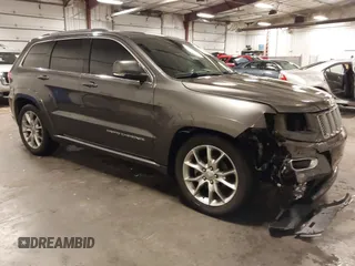 2015 Jeep Grand Cherokee Summit with VIN 1C4RJFJG4FC634129, listed as a IAAI auction lot 42481877 with 149,087 mi miles and . Bid and sale history available at DreamBid. Image 1.