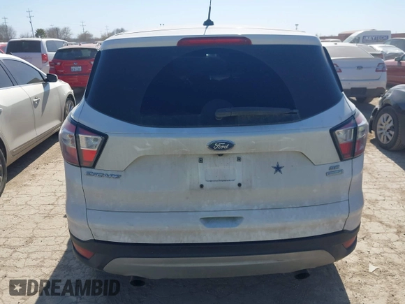 2017 Ford Escape SE with VIN 1FMCU0G90HUD85582, listed as a IAAI auction lot 41733013 with 129,961 mi miles and . Bid and sale history available at DreamBid. Image 16.