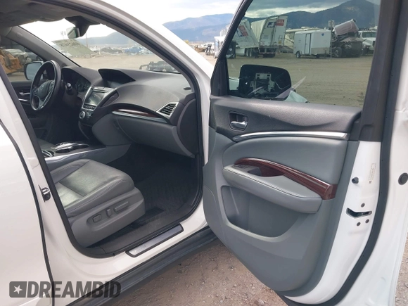 2016 Acura MDX w/Advance with VIN 5FRYD4H91GB034993, listed as a IAAI auction lot 40623678 with 88,027 mi miles. Bid and sale history available at carsss.com. Image 5.