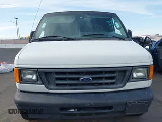 2006 Ford Econoline Cargo with VIN 1FTNE24L56HA73690, listed as a IAAI auction lot 42175802 with Not provided miles and . Bid and sale history available at DreamBid. Image 6.