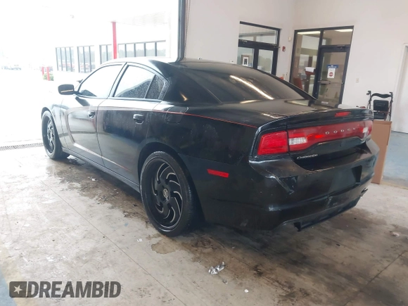 2012 Dodge Charger Police with VIN 2C3CDXAG3CH305132, listed as a IAAI auction lot 41555619 with 128,777 mi miles. Bid and sale history available at carsss.com. Image 3.