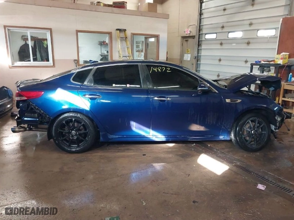 2016 Kia Optima LX with VIN 5XXGT4L33GG026572, listed as a IAAI auction lot 41514872 with 135,423 mi miles. Bid and sale history available at carsss.com. Image 13.