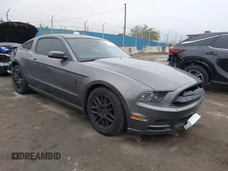 2013 Ford Mustang V6 with VIN 1ZVBP8AM6D5241569, listed as a IAAI auction lot 41884583 with 100,700 mi miles. Bid and sale history available at carsss.com. Image 1.