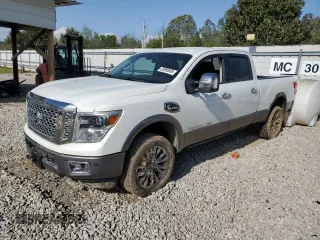 2016 Nissan Titan SL z VIN 1N6BA1F40GN511952, wystawiony jako Copart lot #52695695 z przebiegiem 88 429 mil mil oraz Szkoda całkowita • Salvage title. Historia ofert i sprzedaży dostępna na DreamBid. Obrazek 1.