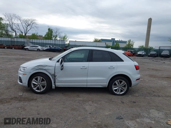 2017 Audi Q3 Premium z VIN WA1ECCFS7HR007729, wystawiony jako IAAI lot #42066580 z przebiegiem 116 460 mil mil oraz . Historia ofert i sprzedaży dostępna na DreamBid. Obrazek 14.