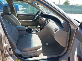 2004 Toyota Avalon XL with VIN 4T1BF28B74U374317, listed as a IAAI auction lot 42039967 with 215,394 mi miles and . Bid and sale history available at DreamBid. Image 5.