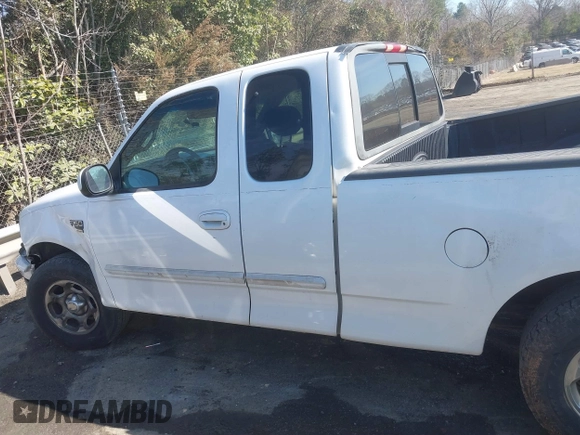 2002 Ford F-150 XL with VIN 1FTRX17L32NA13159, listed as a IAAI auction lot 41653814 with 435,395 mi miles. Bid and sale history available at carsss.com. Image 14.