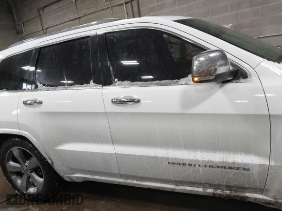 2015 Jeep Grand Cherokee Overland with VIN 1C4RJFCG2FC741015, listed as a IAAI auction lot 41607606 with 132,038 mi miles and . Bid and sale history available at DreamBid. Image 13.