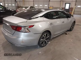 2018 Nissan Maxima SV with VIN 1N4AA6APXJC367526, listed as a IAAI auction lot 41427841 with 113,533 mi miles and . Bid and sale history available at DreamBid. Image 4.