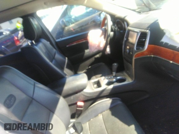 2011 Jeep Grand Cherokee Overland with VIN 1J4RS6GT2BC524217, listed as a IAAI auction lot 41827844 with 33,442 mi miles and . Bid and sale history available at DreamBid. Image 5.