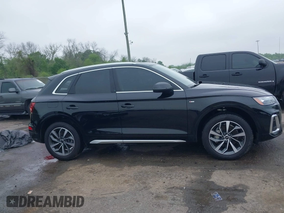 2024 Audi Q5 S line Premium z VIN WA1GAAFY0R2145033, wystawiony jako IAAI lot #41817546 z przebiegiem 1 277 mil mil oraz . Historia ofert i sprzedaży dostępna na DreamBid. Obrazek 13.