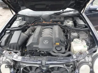 2002 Mercedes-Benz E-Class AWD with VIN WDBJF83J32X068355, listed as a IAAI auction lot 41872613 with 143,501 mi miles. Bid and sale history available at carsss.com. Image 10.