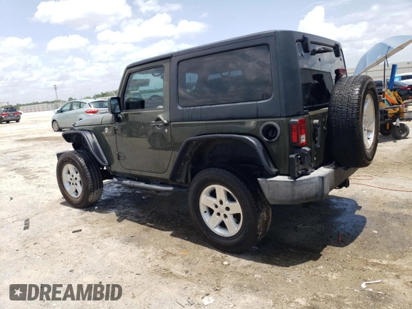 2016 Jeep Wrangler Sport с VIN 1C4GJWAG9GL113657, выставлен на аукционе Copart как лот 59924085 с пробегом 85 375 миль миль и Списание • Salvage title. История ставок и продаж доступна на DreamBid. Изображение 2.