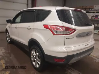 2013 Ford Escape SEL with VIN 1FMCU9H98DUD82751, listed as a IAAI auction lot 41575198 with 166,580 mi miles. Bid and sale history available at carsss.com. Image 3.