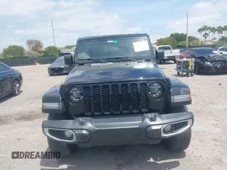 2022 Jeep Gladiator Willys Sport z VIN 1C6HJTAG7NL161701, wystawiony jako IAAI lot #42097144 z przebiegiem 32 989 mil mil oraz . Historia ofert i sprzedaży dostępna na DreamBid. Obrazek 13.