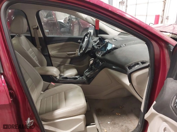 2014 Ford Escape Titanium with VIN 1FMCU9JX0EUC76045, listed as a IAAI auction lot 41119637 with 105,000 mi miles. Bid and sale history available at carsss.com. Image 5.