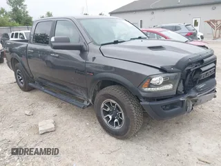 2017 Ram 1500 Rebel with VIN 1C6RR7YT5HS610293, listed as a IAAI auction lot 42454064 with 103,515 mi miles and . Bid and sale history available at DreamBid. Image 1.
