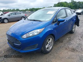 2018 Ford Fiesta SE z VIN 3FADP4BJXJM126168, wystawiony jako IAAI lot #42255261 z przebiegiem 121 248 mil mil oraz . Historia ofert i sprzedaży dostępna na DreamBid. Obrazek 2.