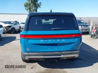 2025 Rivian R1S Adventure with VIN 7PDSGBBA9SN056202, listed as a IAAI auction lot 40766927 with 1,688 mi miles. Bid and sale history available at carsss.com. Image 16.