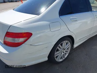 2009 Mercedes-Benz C-Class 3.0L Sport with VIN WDDGF54X09F233877, listed as a IAAI auction lot 42121123 with 215,698 mi miles. Bid and sale history available at carsss.com. Image 6.