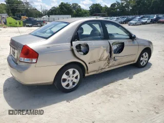2009 Kia Spectra EX with VIN KNAFE221195600794, listed as a Copart auction lot 68090154 with 77,037 mi miles and Salvage Title. Bid and sale history available at carsss.com. Image 3.