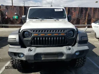 2019 Jeep Wrangler Unlimited Sport Altitude with VIN 1C4HJXDG2KW675235, listed as a Copart auction lot 54389785 with 88,825 mi miles and Salvage title. Bid and sale history available at DreamBid. Image 5.