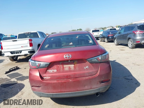 2016 Scion iA with VIN 3MYDLBZVXGY108176, listed as a IAAI auction lot 41590603 with 227,001 mi miles. Bid and sale history available at carsss.com. Image 16.