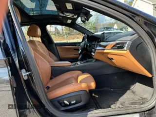 2018 BMW 5 Series 530e xDrive with VIN WBAJB1C57JB084929, listed as a Copart auction lot 50735195 with 139,305 mi miles and Clean Title. Bid and sale history available at carsss.com. Image 6.