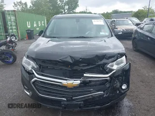 2018 Chevrolet Traverse LT Cloth z VIN 1GNEVGKWXJJ213302, wystawiony jako IAAI lot #42298743 z przebiegiem 138 282 mil mil oraz . Historia ofert i sprzedaży dostępna na DreamBid. Obrazek 12.