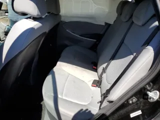 2012 Hyundai Accent SE z VIN KMHCU5AE7CU019999, wystawiony jako Copart lot #52344515 z przebiegiem 110 480 mil mil oraz Szkoda całkowita • Salvage title. Historia ofert i sprzedaży dostępna na DreamBid. Obrazek 11.