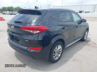 2018 Hyundai Tucson SEL with VIN KM8J3CA47JU696408, listed as a IAAI auction lot 42097978 with 57,607 mi miles and . Bid and sale history available at DreamBid. Image 4.