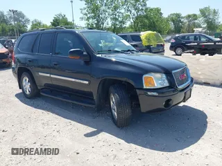 2004 GMC Envoy SLE with VIN 1GKDT13S442447747, listed as a IAAI auction lot 42564882 with 155,135 mi miles and . Bid and sale history available at DreamBid. Image 1.