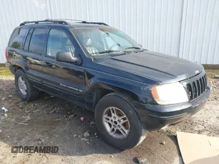 1999 Jeep Grand Cherokee Limited with VIN 1J4GW68S8XC588500, listed as a IAAI auction lot 41484787 with 161,961 mi miles. Bid and sale history available at carsss.com. Image 1.