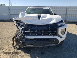 2024 GMC Canyon 4WD AT4 with VIN 1GTP6DEK1R1144016, listed as a Copart auction lot 74384234 with 112 mi miles and Salvage Title. Bid and sale history available at carsss.com. Image 5.