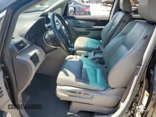2011 Honda Odyssey Touring with VIN 5FNRL5H90BB033700, listed as a Copart auction lot 58602835 with 197,063 mi miles and Clean title. Bid and sale history available at DreamBid. Image 7.